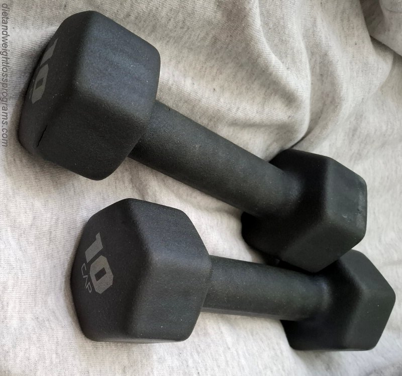 A pair of black Cap Barbell Neoprene 10 lb weights.
